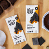 Bittersweet baking bar surrounded by brownies and unwrapped bars
