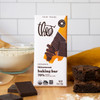 Bittersweet baking bar with brownies on kitchen counter