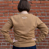 Chocolate Sweatshirt in camel, back of sweatshirt on model