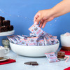 Theo Chocolate Peppermint Cocoa Cups, individually wrapped in bowl