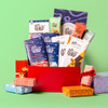 Holiday Magic gift box with contents standing up on green background