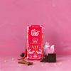 Theo Sweet & Spicy 55% Dark Chocolate Bar unwrapped with ingredients
